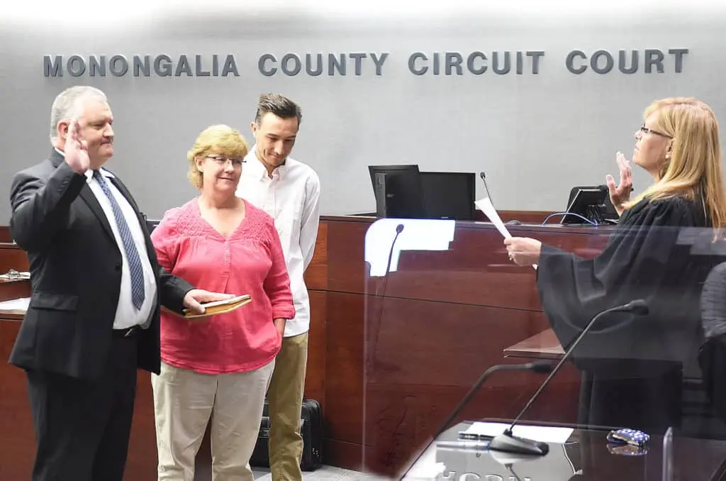Ron Bane Sworn in by Cindy Scott with Family Present Ron Bane Sworn in by Cindy Scott with Family Present.